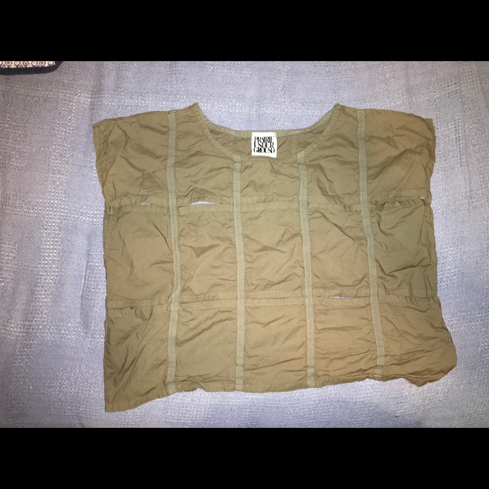 Slit checkered patterned top